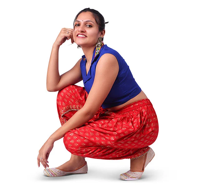 Woman in red saree after professional photo retouching