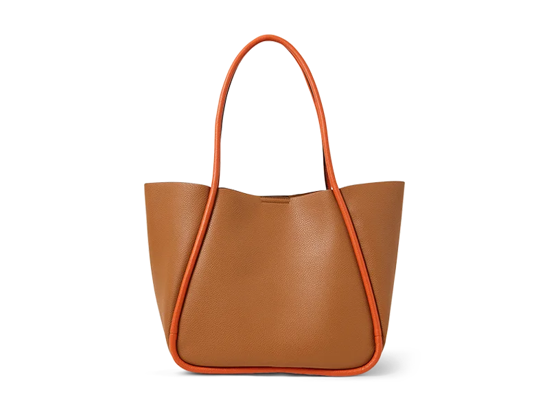 Background removal service for a brown leather handbag