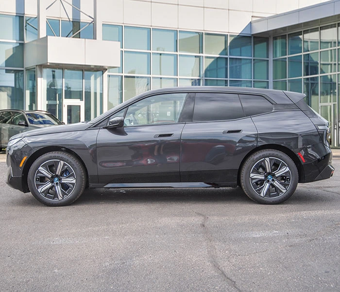 Gray sedan before professional image editing
