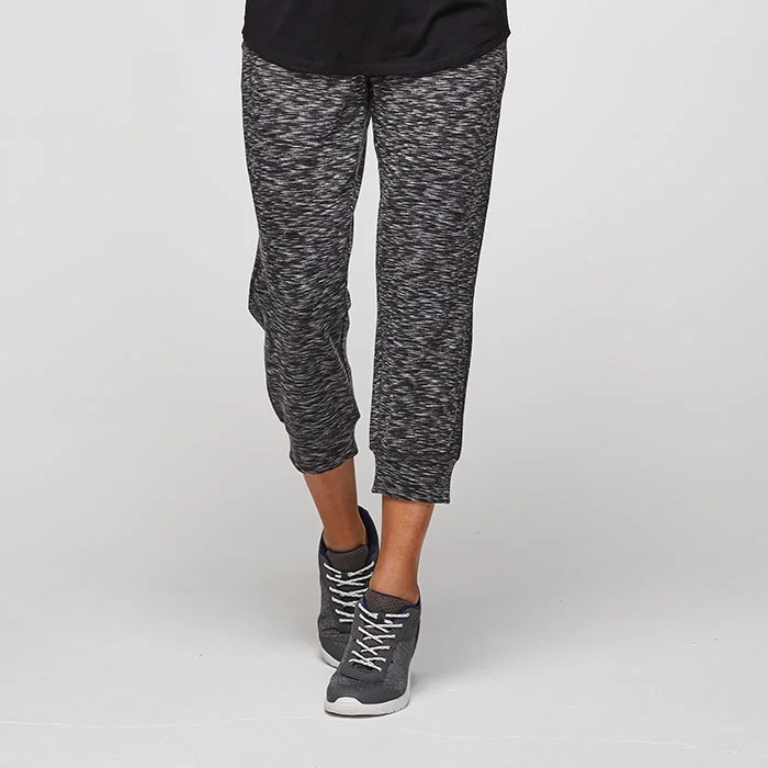 Model wearing leggings before professional photo retouching