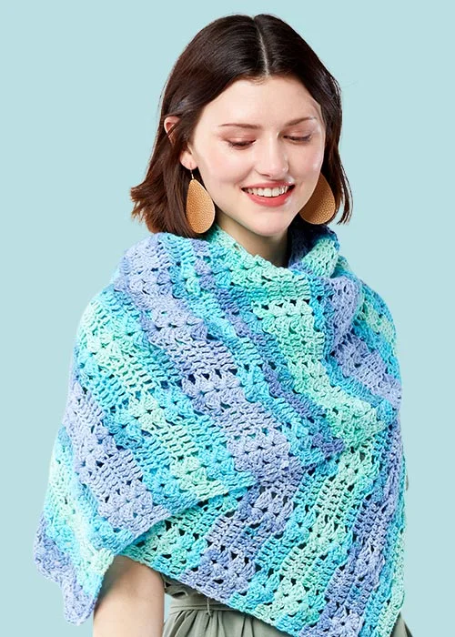 Woman wearing a turquoise scarf professionally retouched