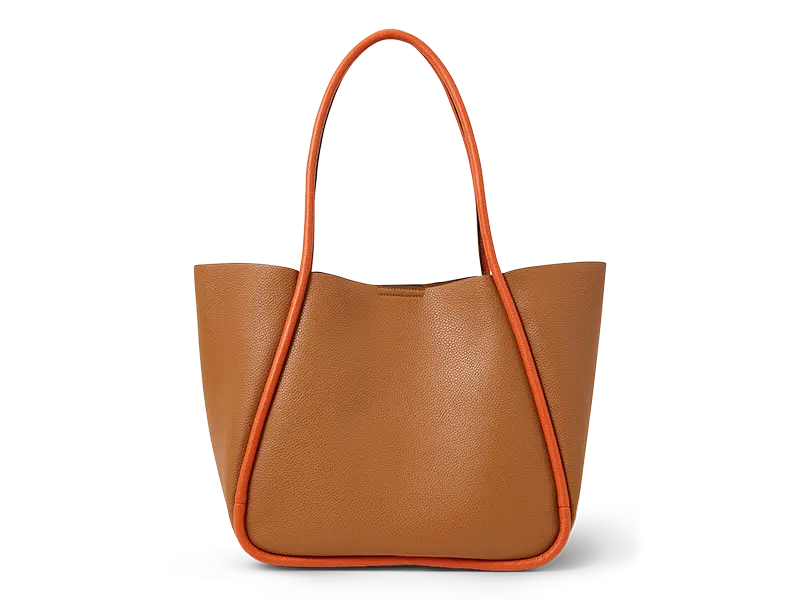 Background removal service for a brown leather handbag